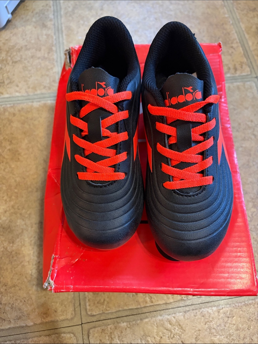 Youth Size 11.5 Diadora Kids Black soccer cleats with orange Accents NWT